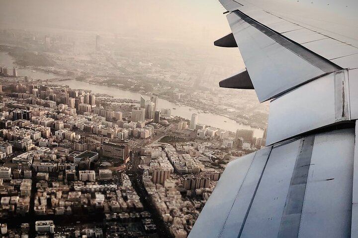 Experience the stunning skyline of Dubai from above where modern architecture meets historic charm. A perfect way to explore the city's essence during a layover.